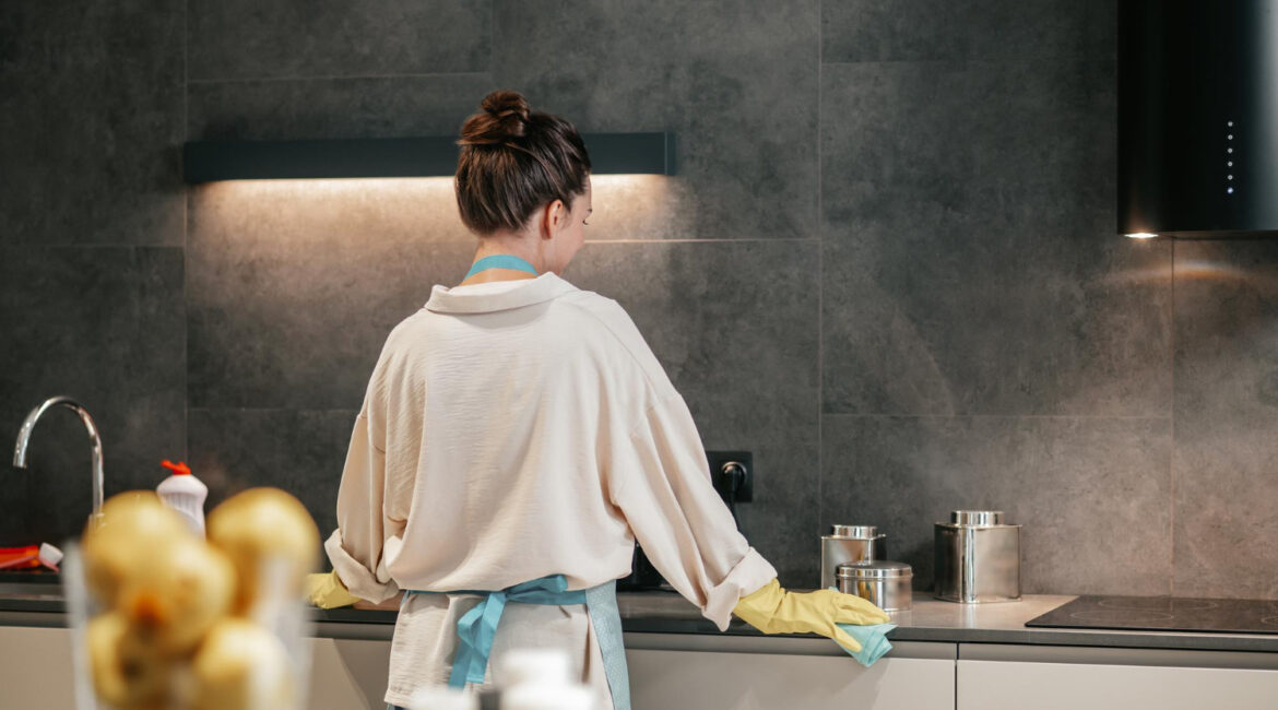 Woman Looking Busy While Cleaning Kitchen